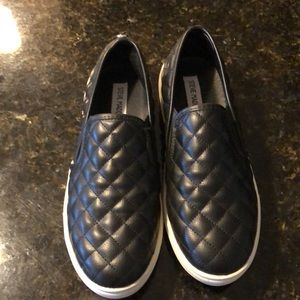 Steve Madden black slip ons